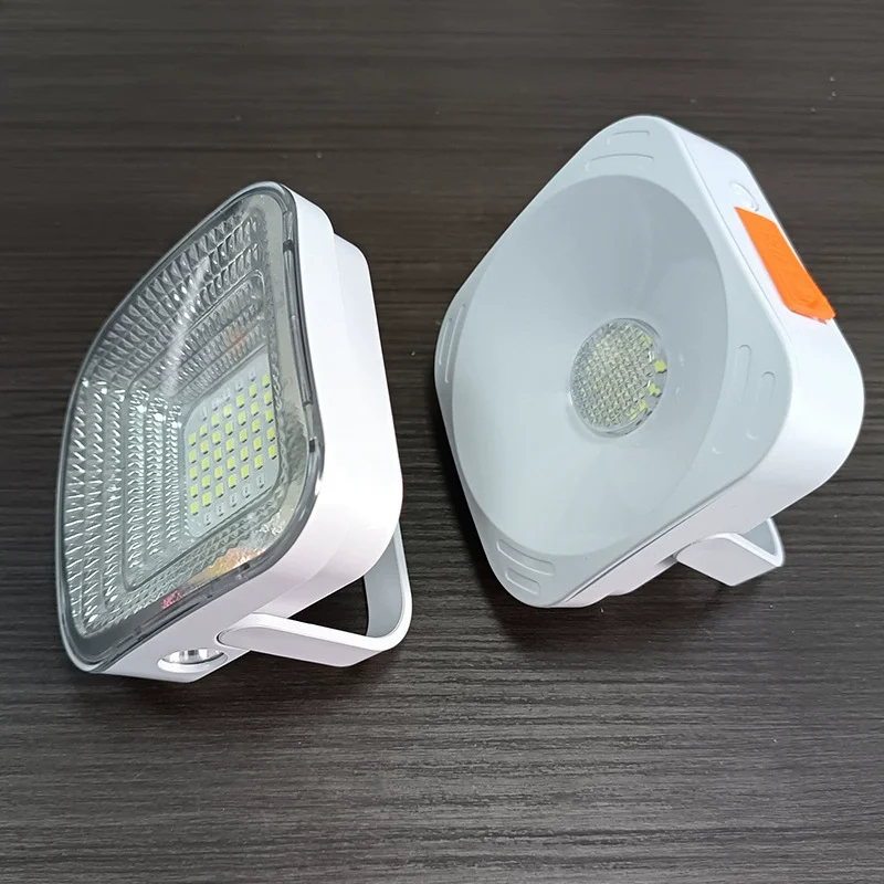 Two portable work-light styles with folding support brackets